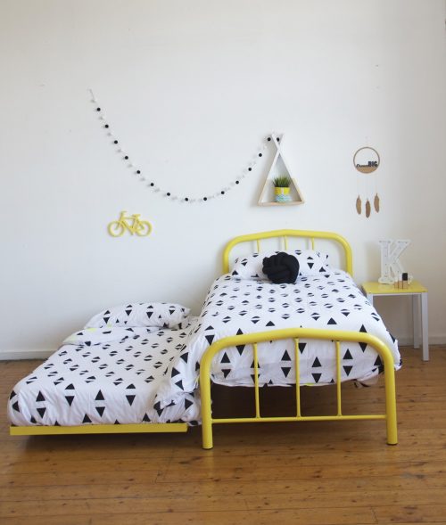 yellow steel frame kids bed with trundle bed pull out by Hypersonic Industries Australia